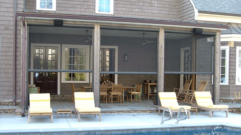 Backyard patio with motorized screens
